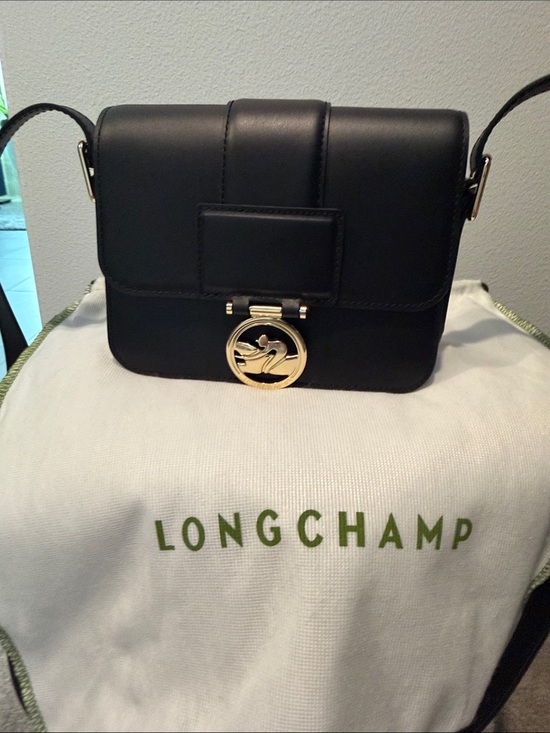 Longchamp Handbags - Longchamp Black Leather Crossbody with Gold Medallion